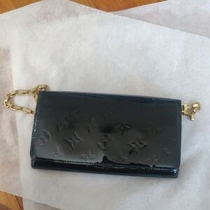 CHANEL Black Clutch with Gold Chain